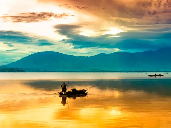 Sun setting over a lake in Vietnam